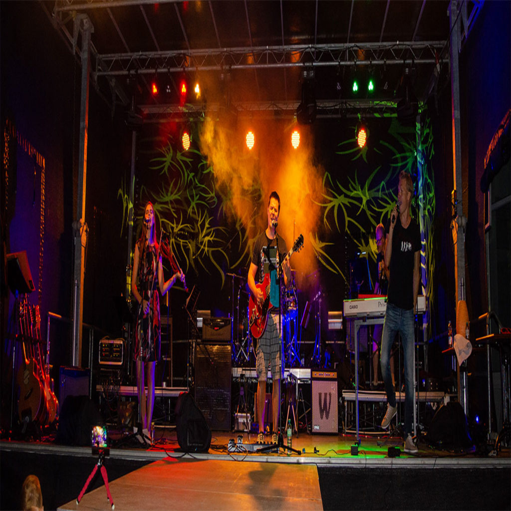 Somephoenics Rockband live concert on stage open air